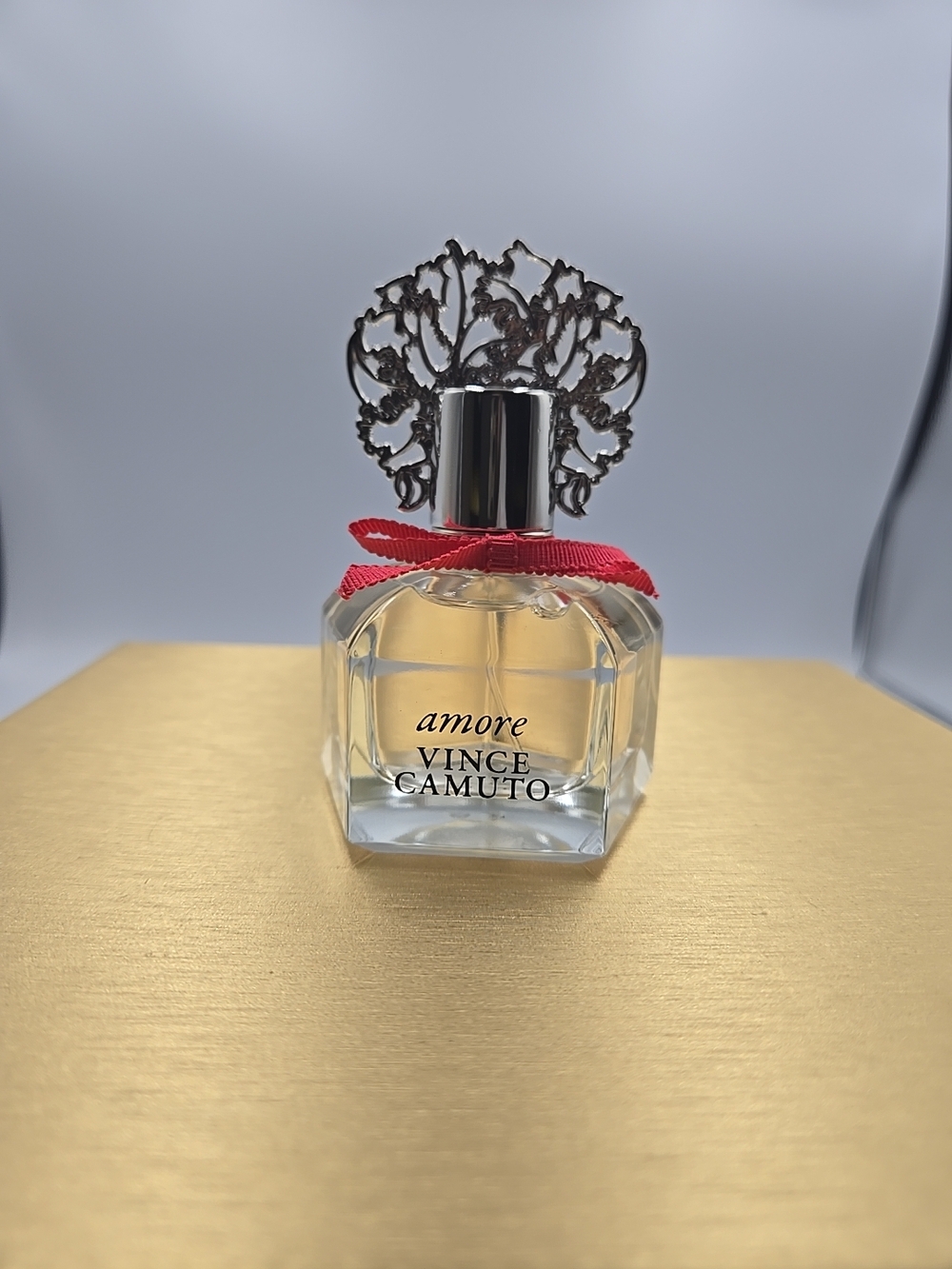 Vince Camuto Amore Clear Bottle with Silver Filigree Cap and Red Ribbon